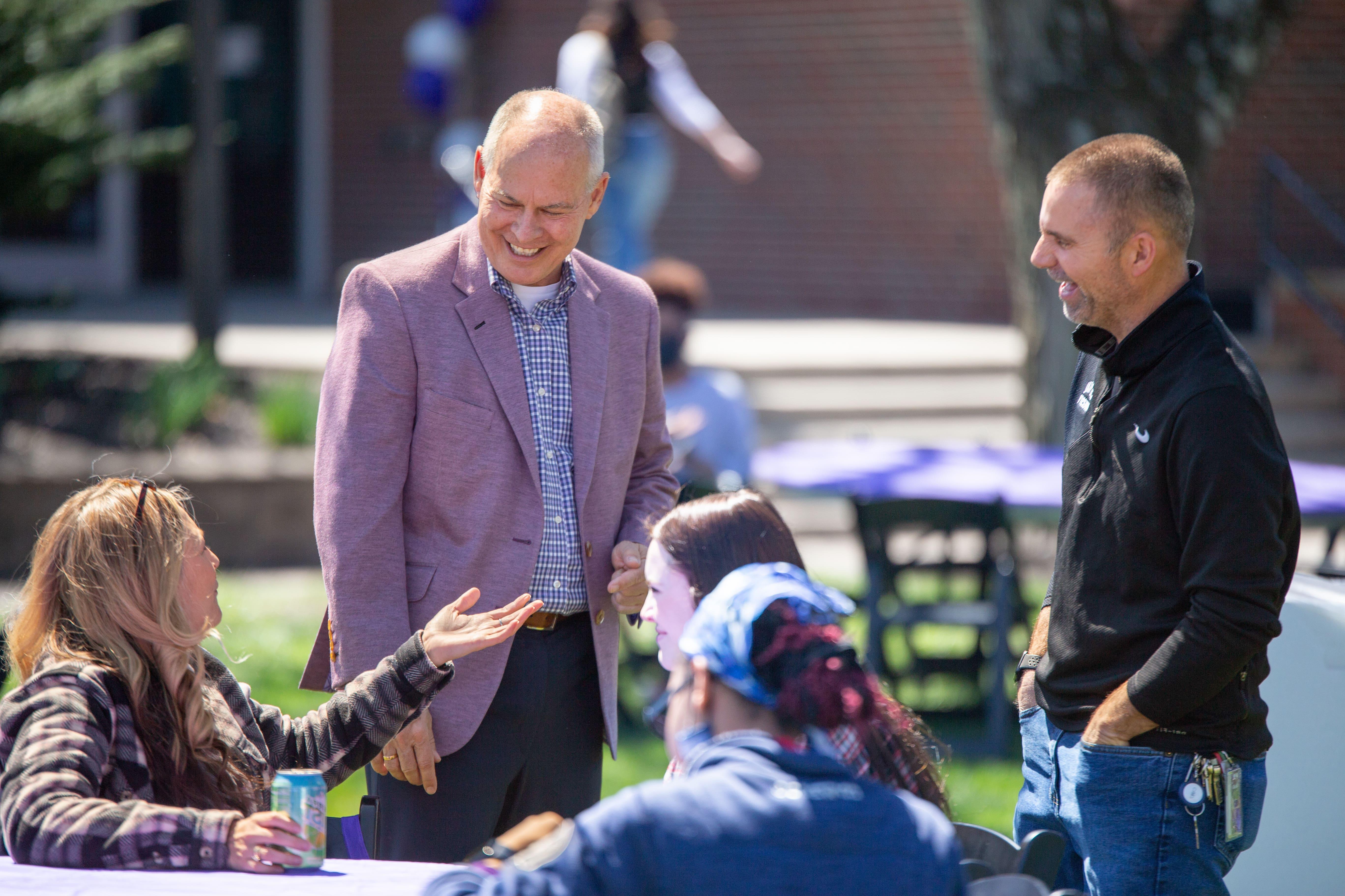 President Kaufman Laughing With Family